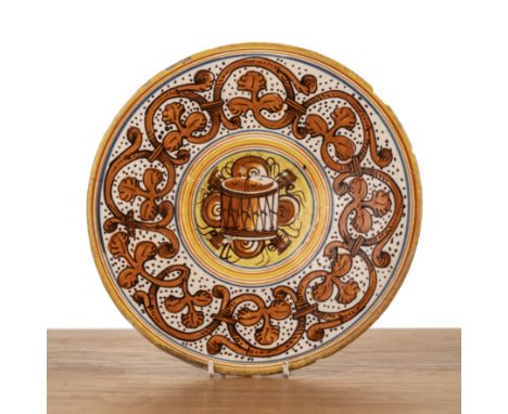 Maiolica Trionfi pedestal dishItalian, Tuscany, circa 1740 painted with a central drum, 24cm   Slightly bowed. With some chip