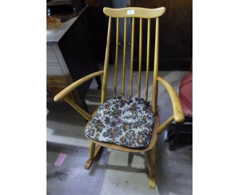 An Ercol light elm rocking armchair