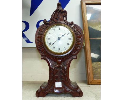 A rococo style mantel clock with French 8 day movement