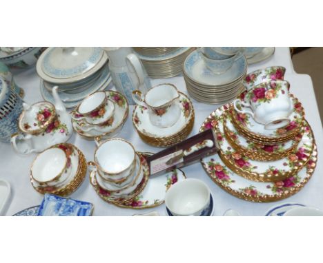 A Royal Albert Country Roses tea and dinner service
