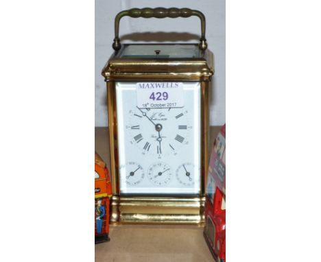 A 20th century carriage clock with 3 subsidiary "L'Epee" France dials and hour repeating movement