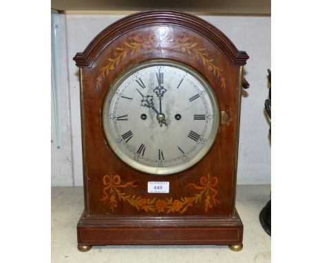 A late 19th century mahogany cased mantel clock with inlaid decoration, 8 day twin fusee movement with silvered dial, 17"