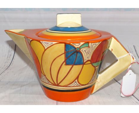 A Clarice Cliff Melon pattern teapot with associated cover, length 9"