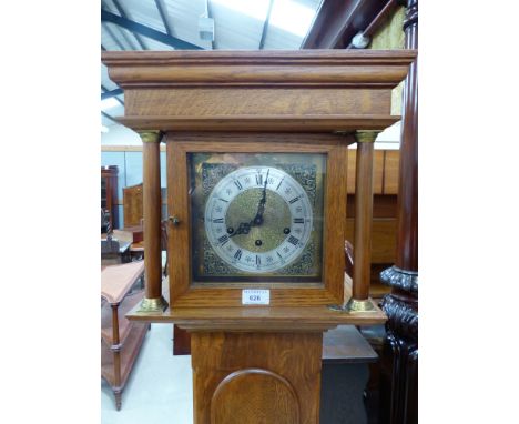 A "Lincolnshire Oak" cased longcase clock, period style with chiming spring driven movement