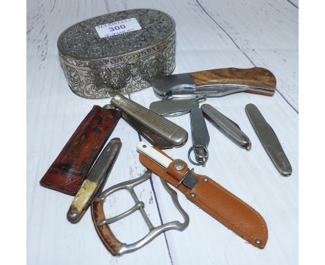A silver plated chased oval trinket box; a selection of penknives; etc.