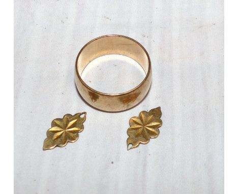 A 9 carat hallmarked gold wedding ring; a pair of 9 carat hallmarked gold earrings (no studs) 5.2 gm