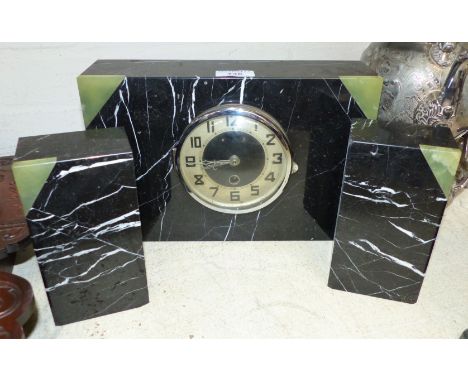 An Art Deco black marble 3 piece clock garniture