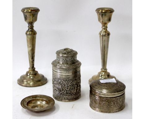 A BURMESE WHITE METAL TEA CADDY of cylindrical form, 13cm in height; and a further Burmese white metal cylindrical box and co