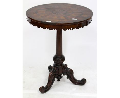 A VICTORIAN MAHOGANY TRIPOD TABLE with a parquetry inlaid circular top, a turned stem and scrolling legs, 60cm diameter