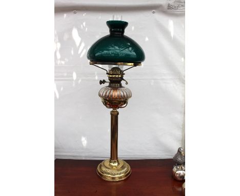 AN OLD BRASS OIL LAMP with green glass shades and clear glass reservoir, 75cm high overall 
