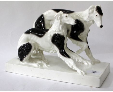 A GOLDSCHEIDER AUSTRIAN PORCELAIN FIGURE GROUP OF DOGS signed and marked to the base, 29cm x 20cm
