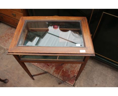 A SMALL MAHOGANY BIJOUTERIE TABLE 63cm wide together with a tilt top circular tripod table (2)