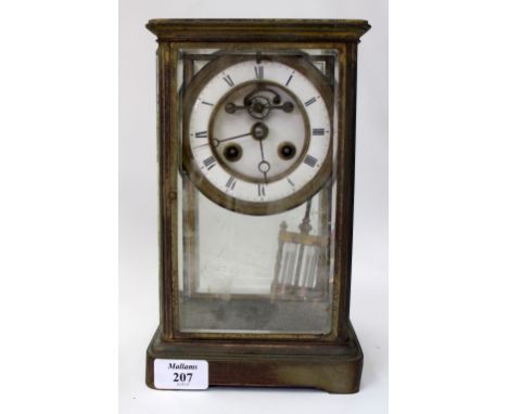 A FRENCH FOUR GLASS MANTEL CLOCK the two piece white enamel Roman dial with visible escapement, Marti movement and mercury co