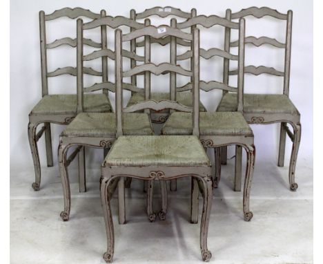 A SET OF SIX FRENCH GREY PAINTED CHAIRS with ladder backs, rush inset seats and cabriole legs 