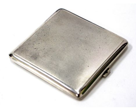 A MAPPIN & WEBB SILVER POWDER COMPACT with engine turned decoration