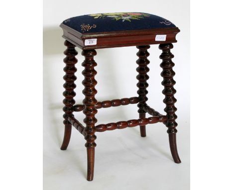 A VICTORIAN MAHOGANY STOOL  with bobbin turned legs and needlework upholstered seat, 34cm wide x 50cm high 