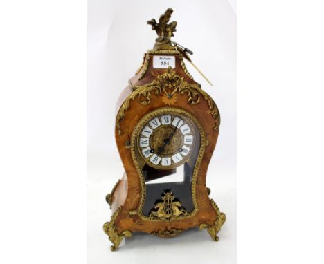 A MID TO LATE 20TH CENTURY MARQUETRY CASED MANTLE CLOCK with gilt mounts and a German movement, 23cm wide x 44cm high
