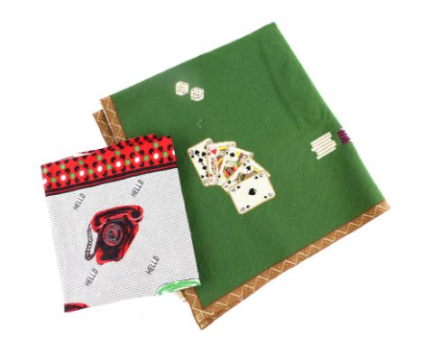 An East African printed Kanga with repeated telephone design 108cm x 66cm Wool work playing cards panel on green ground 103cm