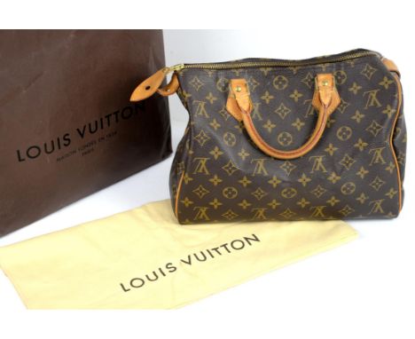Louis Vuitton classic Speedy 30 handbag in tan and brown house monogram , together with padlock, keys, dustbag and copy recei