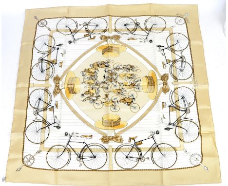 Classic Hermes scarf in creams and beige Les Becanes (bikes) design designed by Hugo Grygkar in 1957. Reissued in 1973, 1990,