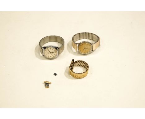 An Omega stainless steel cased manual wrist watch on expanding bracelet; a Corvette 17 jewel gentleman's automatic wrist watc