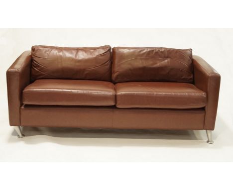 A modern two seater leather sofa, 62cm high x 178cm long x 89cm wide.