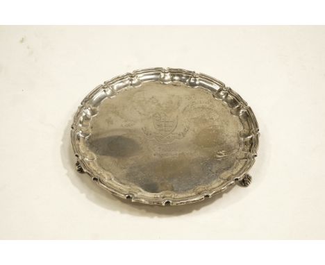 A late Victorian silver salver, by William Hutton & Sons Ltd, London 1895, of circular shaped outline on three scroll support