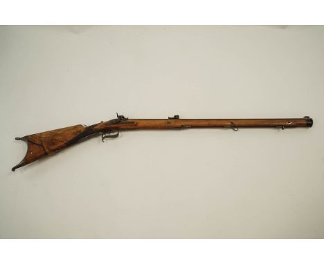 A 19th Century flintlock percussion rifle, with steel metal mounts, barrel engraved W WOLF.IN.SUHL, with walnut stock, 127cm 