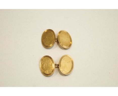 A pair of 9 carat cufflinks, by Payton Pepper Ltd, Birmingham 1937, the oval panels with chain connectors, 7.9 g gross, cased