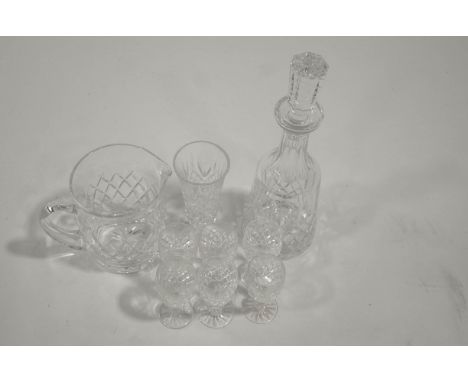 A collection of Waterford crystal, comprising a boxed set of six sherry glasses in the Boyne pattern, a Lismore Essence wine 