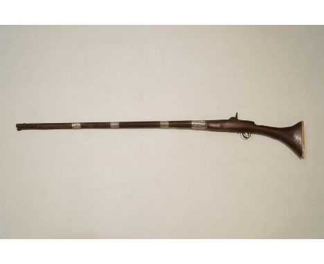 A 19th Century percussion rifle with white metal mounts and an ivory and wooden stock, marking  "U. S. Watertown, 1861" and a