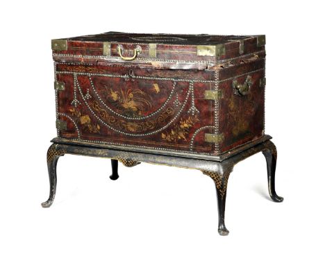 A GEORGE III PAINTED LEATHER TRUNK ON STANDLATE 18TH CENTURYbrass studded and decorated with gilt flowers, birds and Chinese 