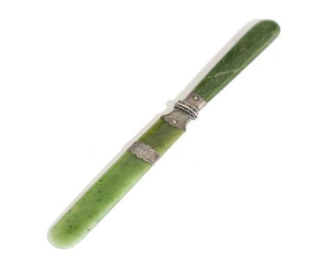 A VICTORIAN NEPHRITE JADE PAPER KNIFELATE 19TH CENTURYwith engraved white metal mounts24.7cm long