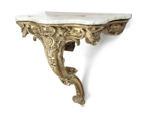 A VICTORIAN GILTWOOD AND COMPOSITION CONSOLE TABLEIN ROCOCO STYLE, C.1860with a serpentine marble top above a frieze decorate