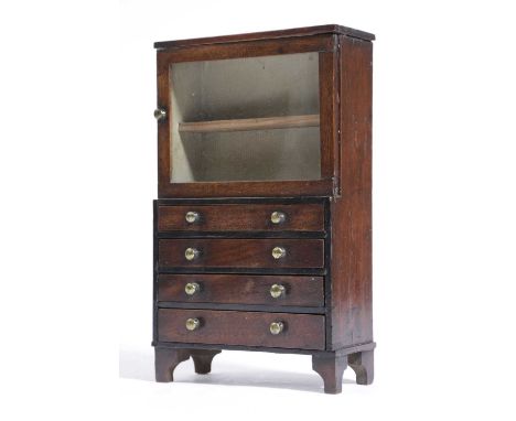 A MINIATURE REGENCY MAHOGANY BOOKCASE IN THE MANNER OF JOHN BUBB, EARLY 19TH CENTURYpossibly an apprentice piece, the glazed 