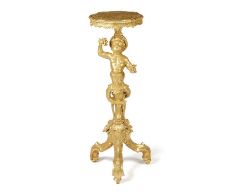 AN ITALIAN GILTWOOD FIGURAL TORCHÈREVENETIAN, LATE 19TH CENTURYthe child's bust supporting a shaped oval tray, above scrollin