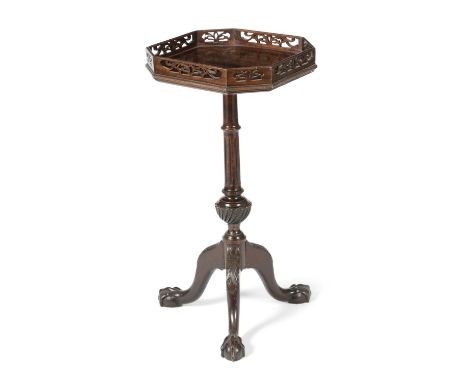 A MAHOGANY TRIPOD WINE TABLEIN GEORGE II STYLE, 19TH CENTURYthe octagonal top with a pierced gallery, above a fluted stem and