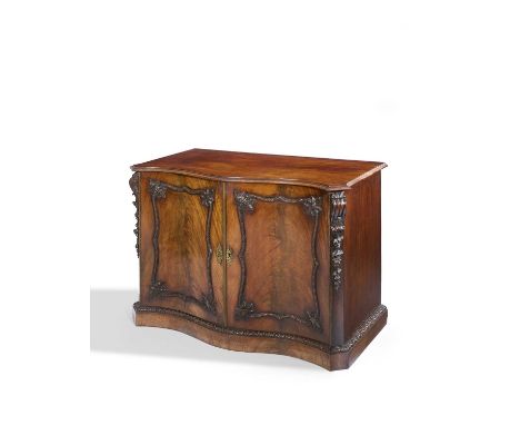 A MAHOGANY SERPENTINE SIDE CABINETIN THE MANNER OF WRIGHT & ELWICK,18TH CENTURY LATERthe top with a moulded edge above a pair