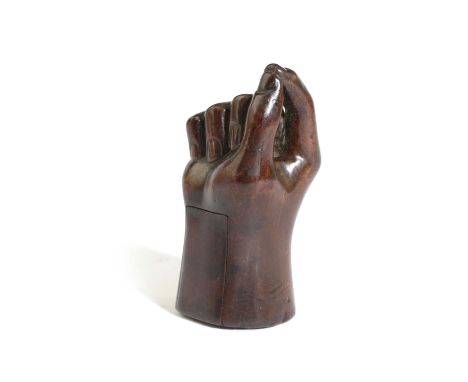 A TREEN 'PINCH OF SNUFF' SNUFF BOX 19TH CENTURYcarved in the form of a hand, with a sliding cover8.3cm high