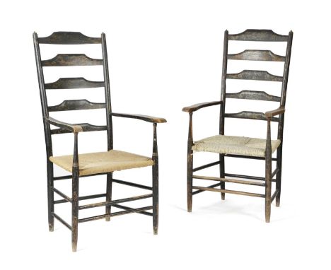 A PAIR OF BLACK JAPANNED ASH LADDER BACK ARMCHAIRSLATE 19TH CENTURYeach gilt decorated with flowers, leaves, one with buildin