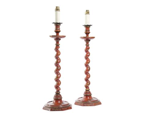 A PAIR OF RED JAPANNED CANDLESTICK TABLE LAMPSIN QUEEN ANNE STYLE, LATE 19TH CENTURYeach decorated in gilt with flowers, leav