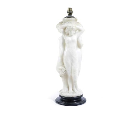 A CONTINENTAL ALABASTER LAMP BASELATE 19TH CENTURYmodelled as the Three Graces49cm high (max)