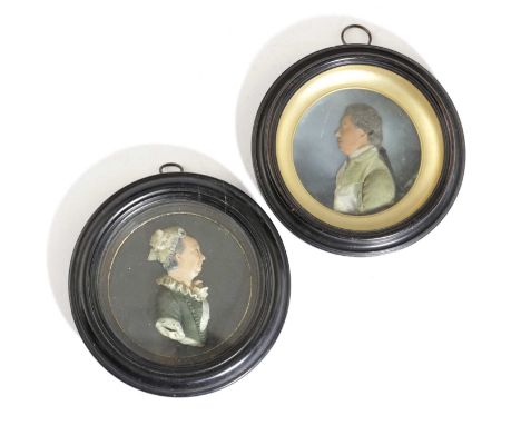 TWO GEORGE III COLOURED WAX PORTRAIT RELIEF BUSTS LATE 18TH / EARLY 19TH CENTURYdepicting a Georgian gentleman and lady in pr