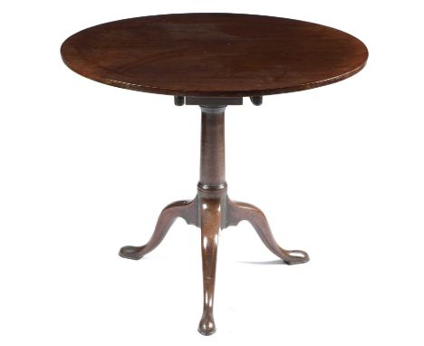A GEORGE II MAHOGANY TRIPOD TABLEC.1740-50 AND LATERthe circular tilt-top revolving on a birdcage69.4cm high, 82.2cm diameter