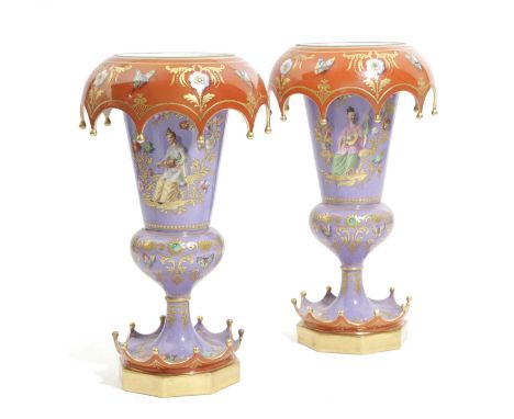 A PAIR OF PORCELAIN OIL LAMP BASESPROBABLY FRENCH, MID-19TH CENTURYof flared form, painted and gilded with Chinese style figu