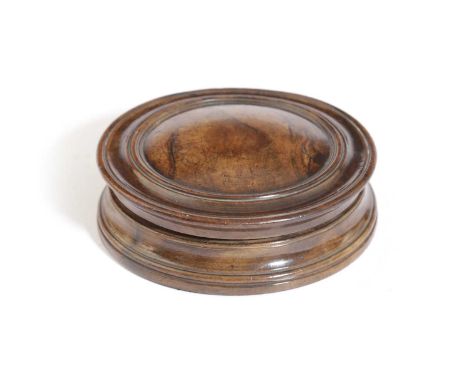A TREEN OLIVEWOOD BOX C.1830-50possibly for a wax desk seal or for snuff, of circular form with a pull-off cover with moulded