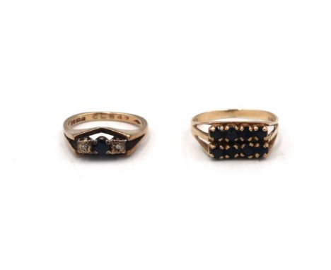 Two 9ct gold rings. To include a two row circular sapphire ring, size T and a sapphire and diamond three stone ring, size M. 