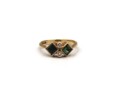 An 18ct square green tourmaline and brilliant cut diamond dress ring. Size R. Weight 4.53 grams.