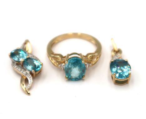 Three pieces of 9ct blue and white zircon jewellery. To include an oval single blue stone pendant, A two stone pendant both w