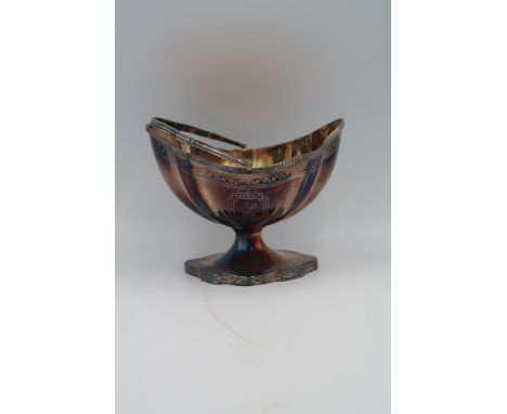 A silver hallmarked George III 1793, Thomas Olyphant, London, boat shaped sugar basin with handle, engraved decoration, appro